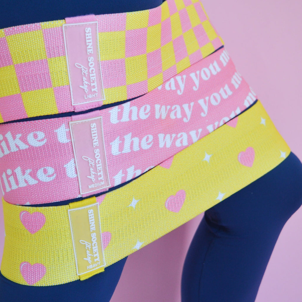 Pink and yellow patterned Hip bands 