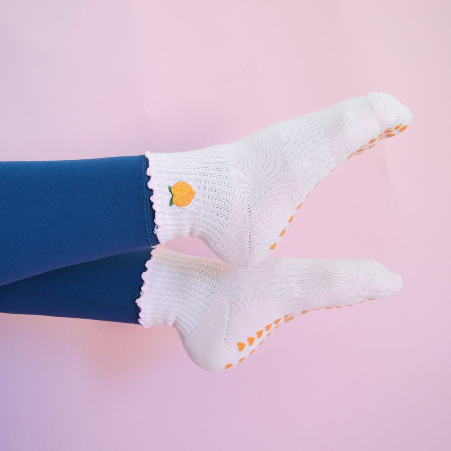 light pink grip socks with peach 