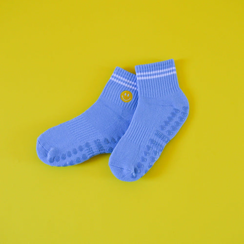 Blue socks with a yellow smiley face