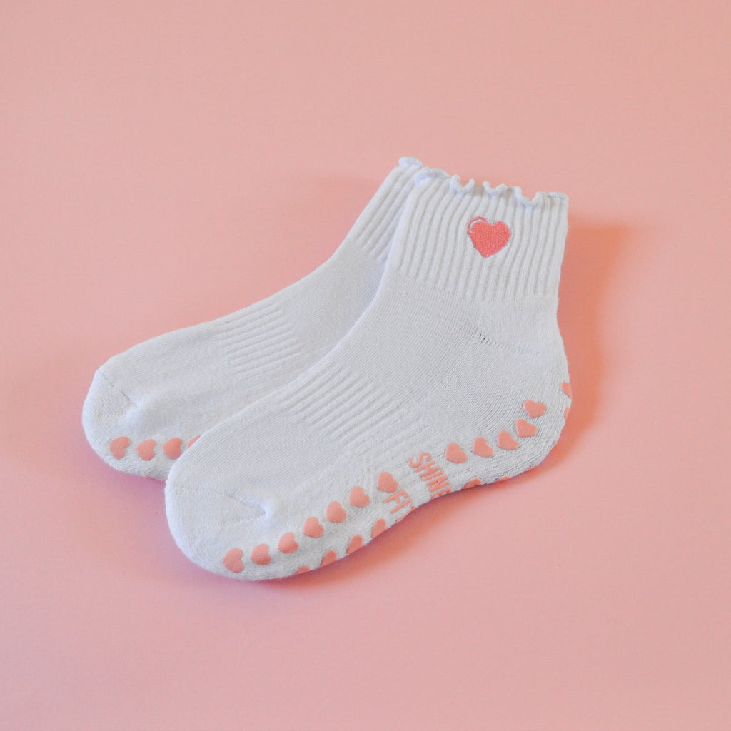 white grip socks with heart 